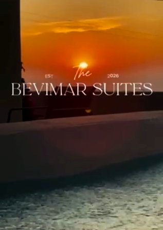Sunset over a pool with the Bevimar Suites logo and the words EST 2026 on the horizon.