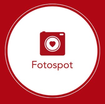Fotospot logo showing a red camera icon with a heart inside a white circle on a white circular badge with a red outer ring.